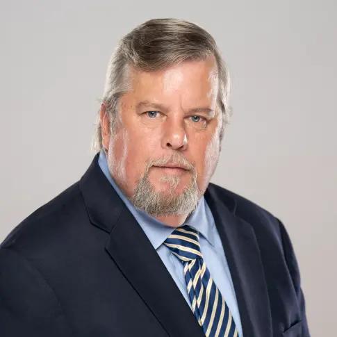 Headshot of Ryan Brennan