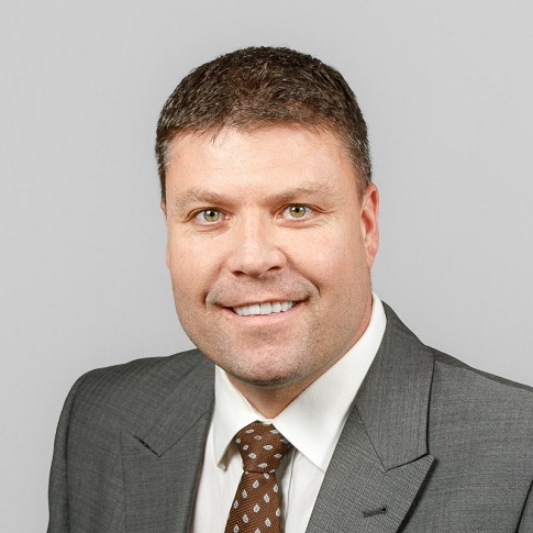 Headshot of Travis Dickinson