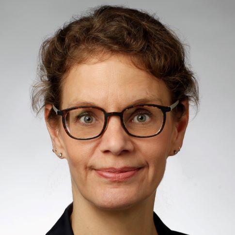 Headshot of Dr. Uda Buttig
