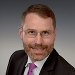 Wilhelm-Friedrich Puschinski, Managing Director Retirement, Chefaktuar