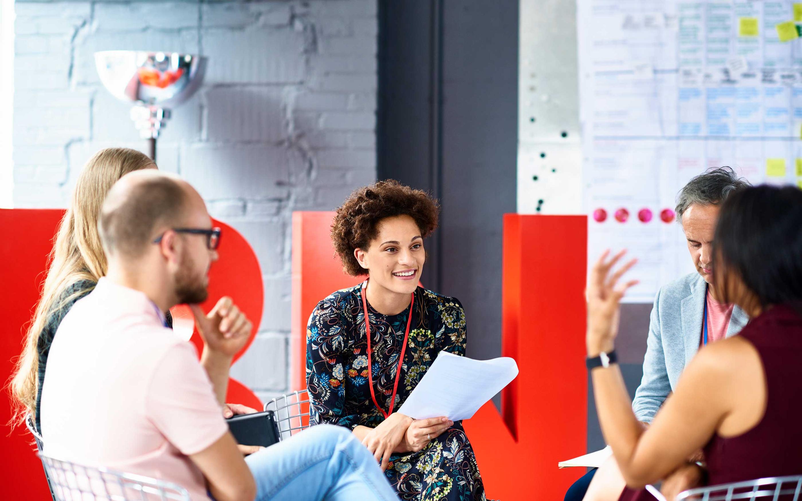 People having meeting in modern office