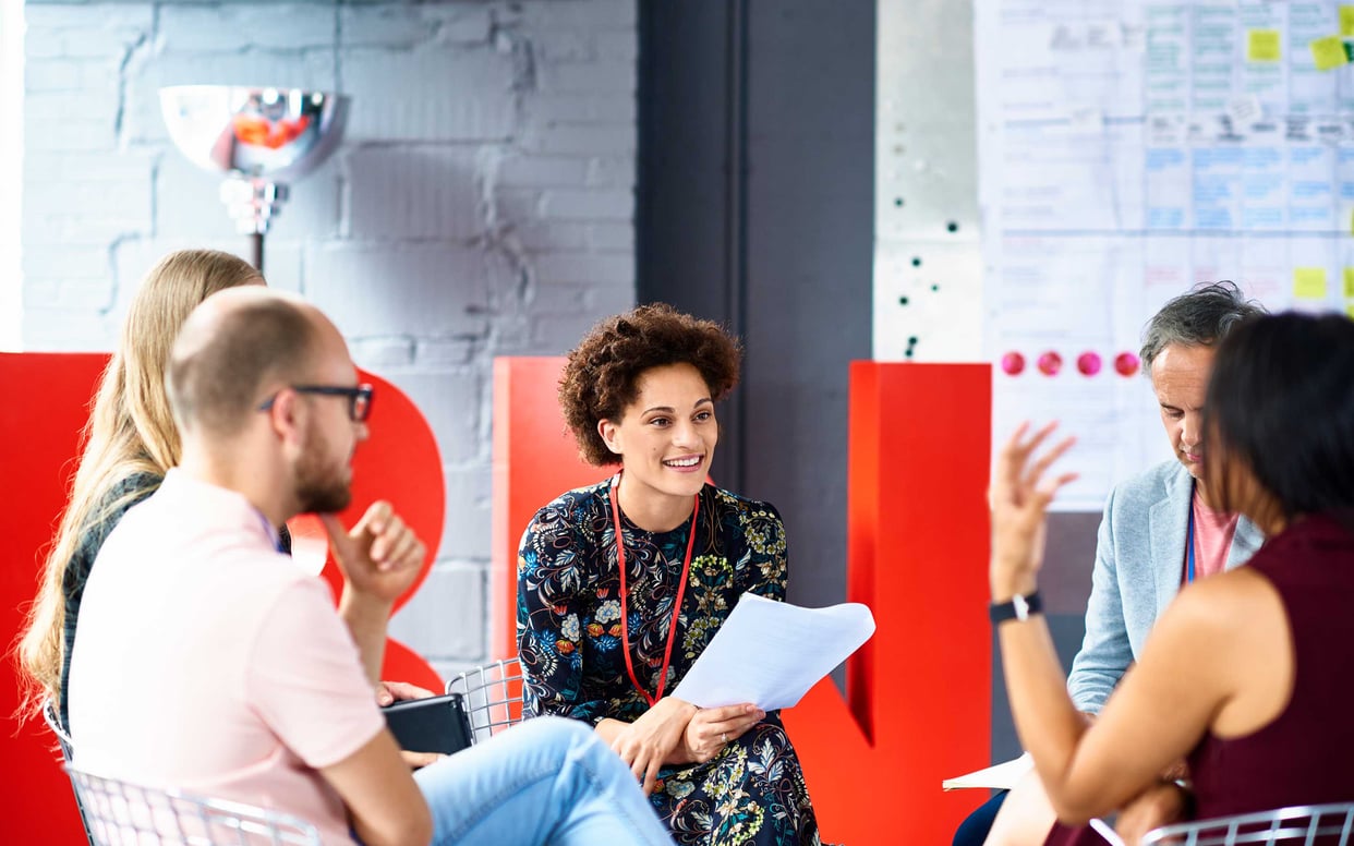 People having meeting in modern office