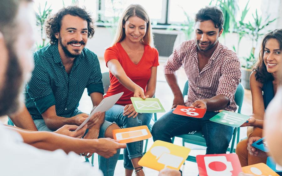 Group of people interacting with cue cards